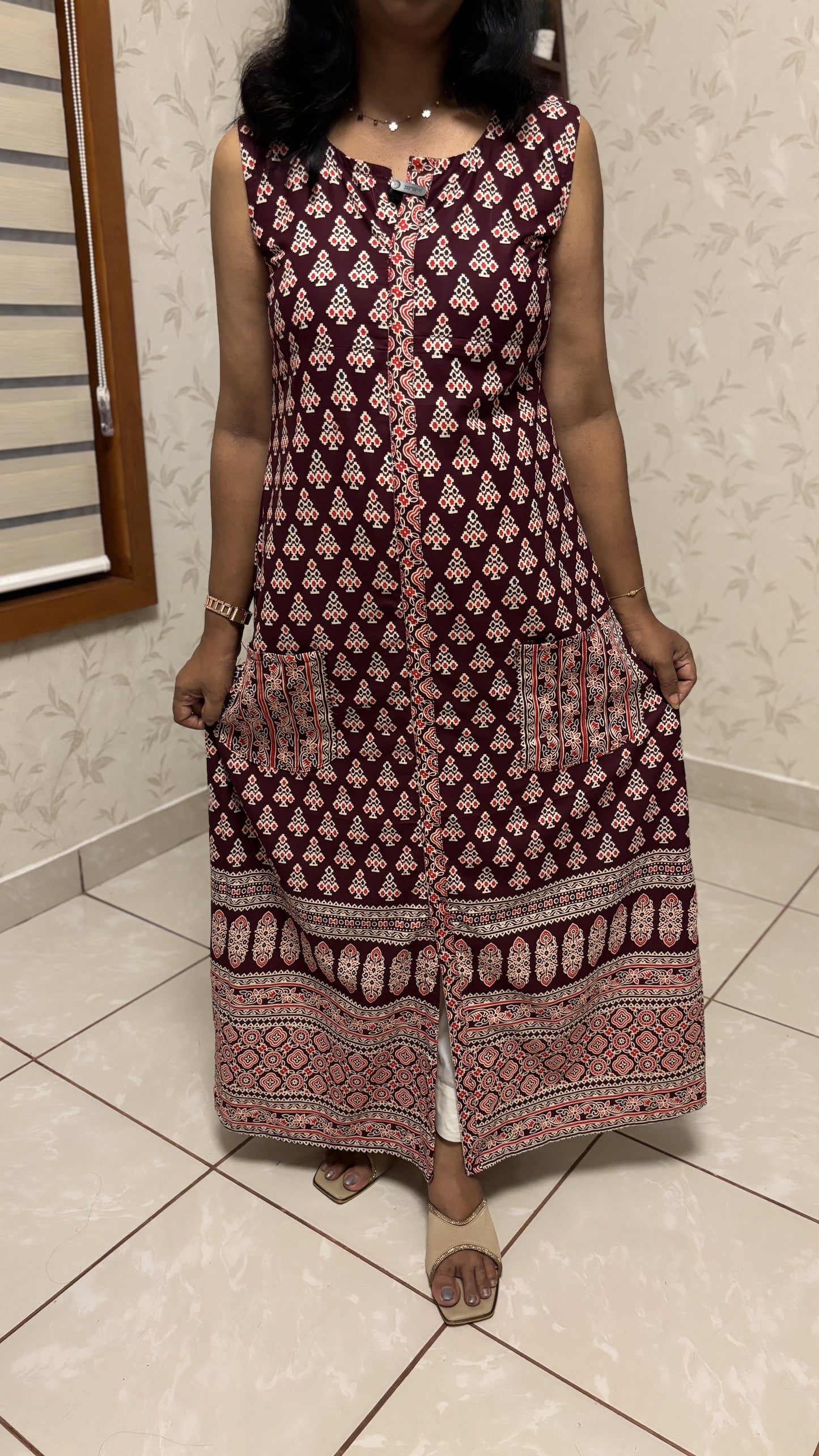 Maanvi Pure Cotton Ajrakh Sleeveless Kurti with Boat V-Neck & Pocket Detail | MA-2024