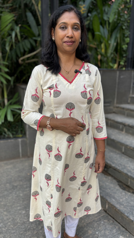 Maanvi Soft Cotton A-Line Kurti with Panel Cut & Lace Detail | Ivory Printed V-Neck Ethnic Wear for Women
