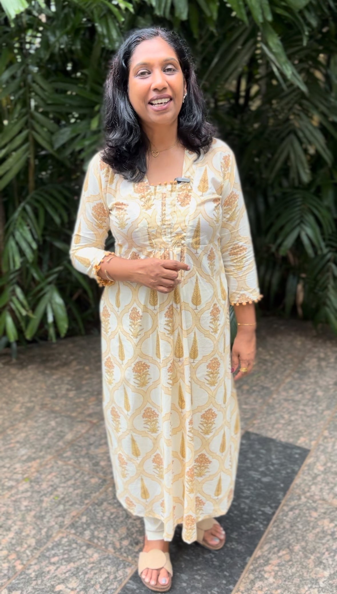 Maanvi Yellow Cotton A-Line Kurti with Collar Neck & Potli Button Detail | Pintuck Ethnic Wear with Pockets for Women