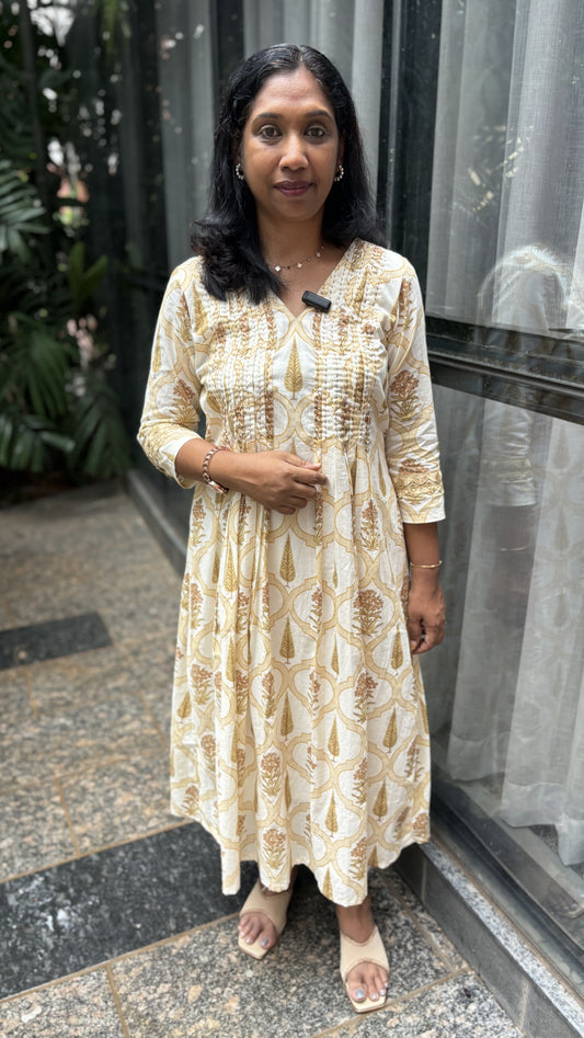 Maanvi Ivory Cotton Pintuck Kurti with Kantha & Lace Detail | Yellow Printed Ethnic Wear for Women