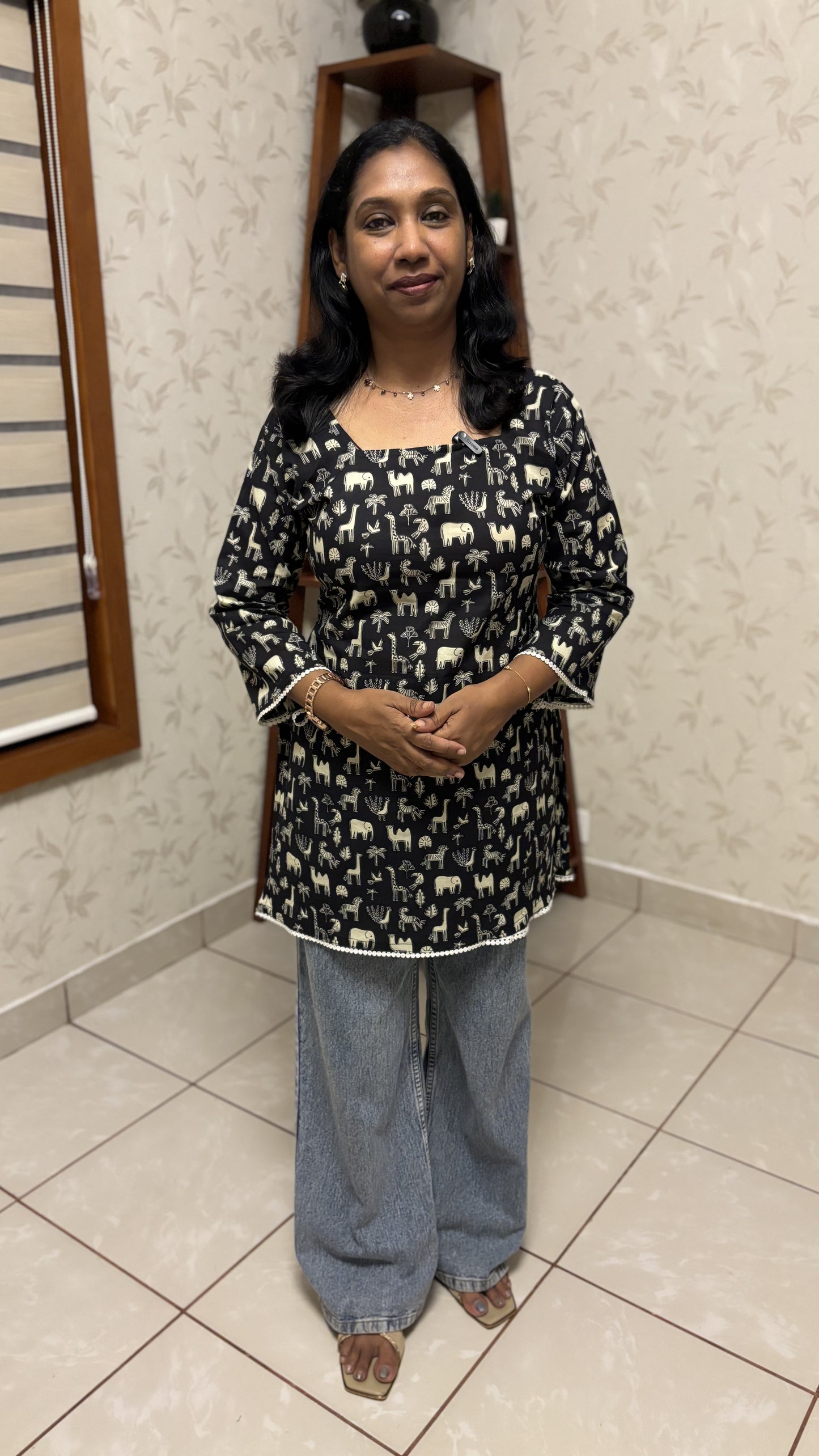 Maanvi Animal Print Short Kurti with Back Loop Detail & Bell Sleeves | MA-2026