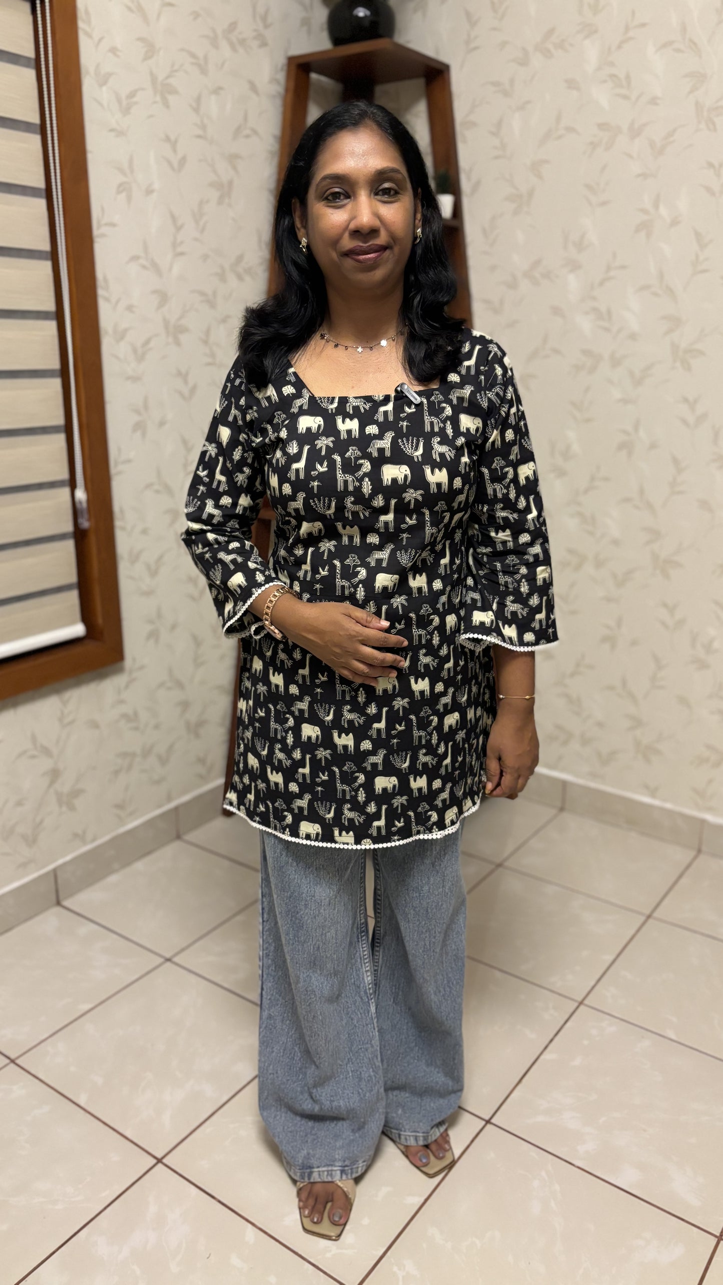 Maanvi Animal Print Short Kurti with Back Loop Detail & Bell Sleeves | MA-2026