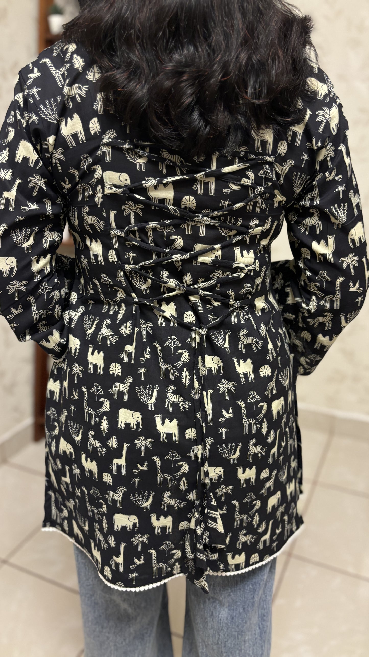 Maanvi Animal Print Short Kurti with Back Loop Detail & Bell Sleeves | MA-2026