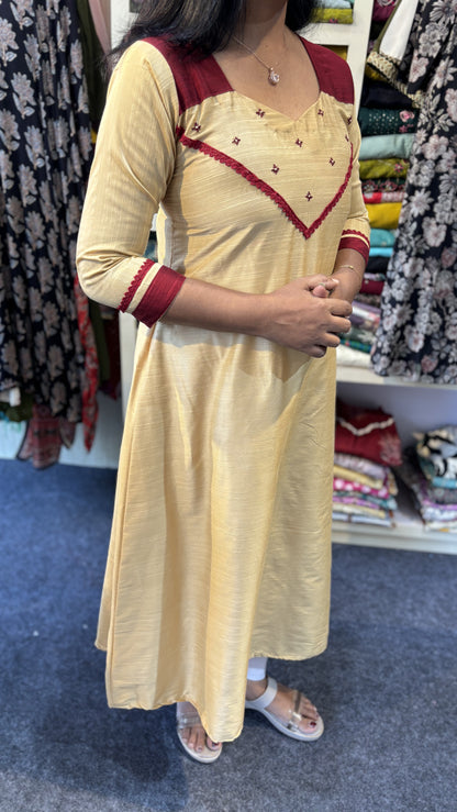 Maanvi Dark Ivory & Maroon Slub Cotton A-Line Kurti with Hand Embroidered Bhutta, Lace & Patch Work | MA-2079