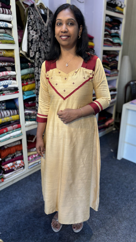 Maanvi Dark Ivory & Maroon Slub Cotton A-Line Kurti with Hand Embroidered Bhutta, Lace & Patch Work | MA-2079